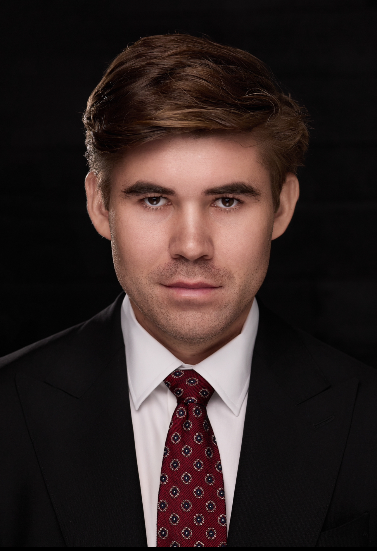 Headshots of Andrew Sobko